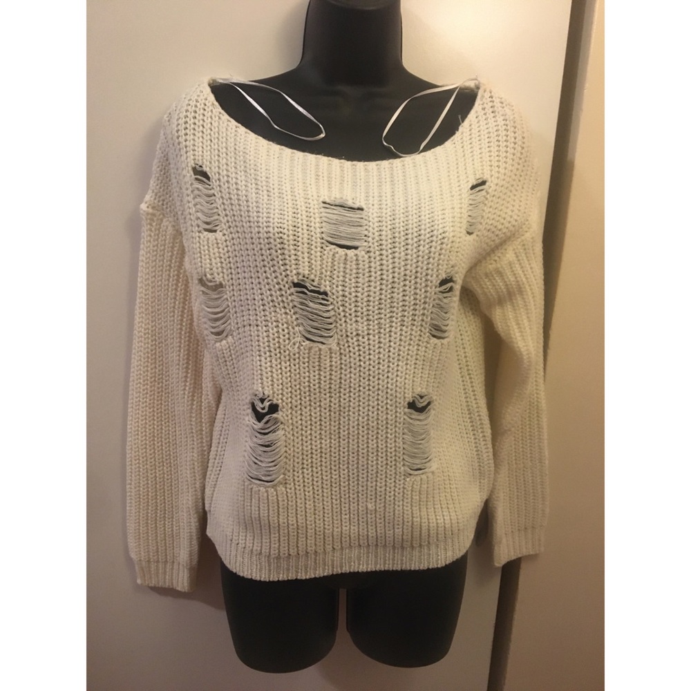 Distressed white sweater
